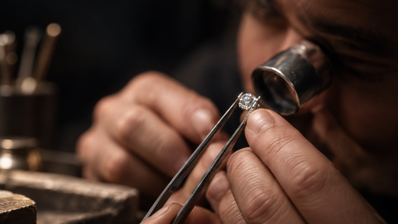Jeweler inspecting a diamond ring
