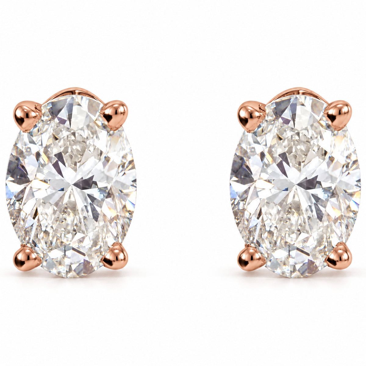 Oval 4-Prong Lightweight Stud Earrings — 14K Rose Gold — 3 x 2.3mm — 1/10 CTW — view 2
