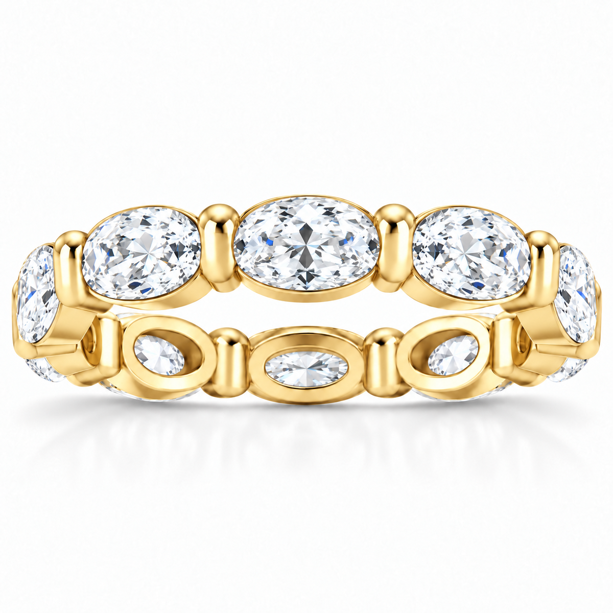 East-west oval shared-prong lab-grown diamond eternity band, 6 x 4 mm diamonds, 14K yellow gold, front studio view