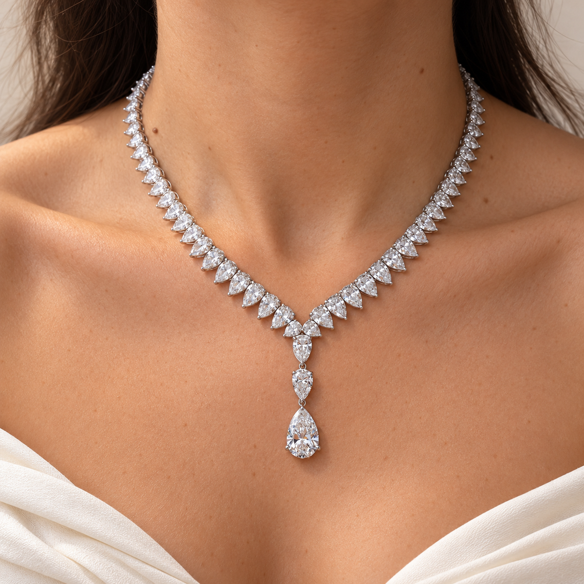 Pear diamond necklace worn on the body