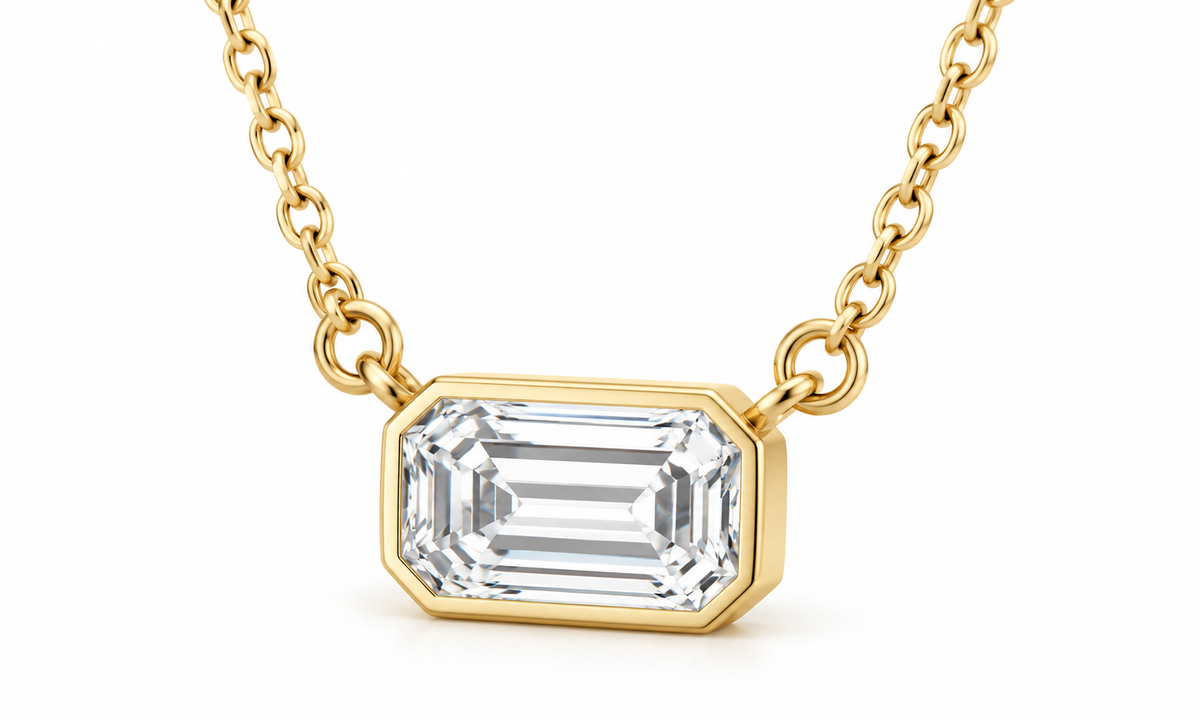 14K Yellow Gold 1/3 CT (5 x 3 mm) emerald-cut lab-grown diamond bezel necklace — studio angle view