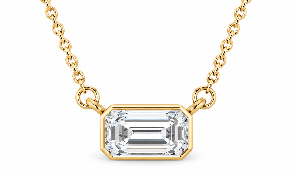14K Yellow Gold 1/3 CT (5 x 3 mm) emerald-cut lab-grown diamond bezel necklace — studio front view