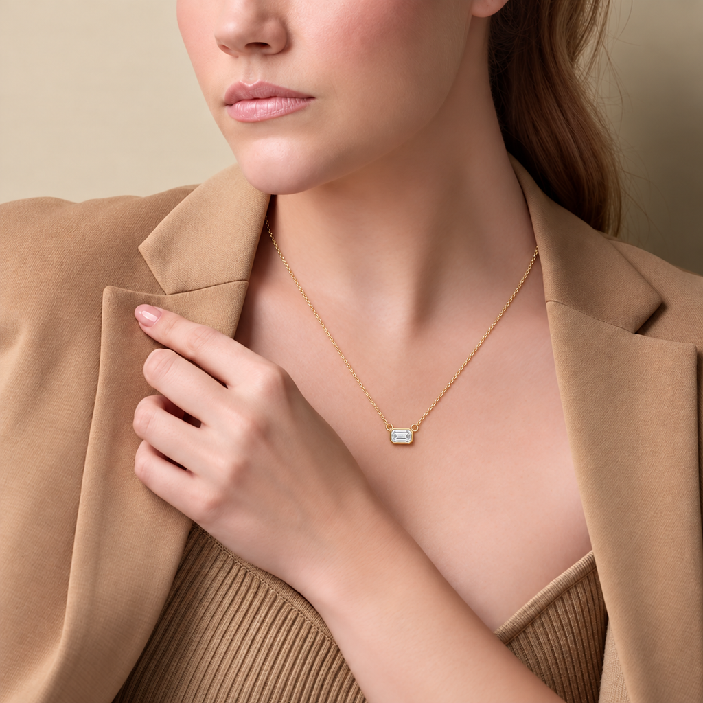 14K Yellow Gold 1/3 CT (5 x 3 mm) emerald-cut lab-grown diamond bezel necklace — on-body view