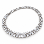 Angled view of alternating pear diamond necklace