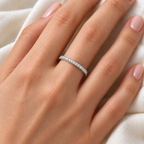 Round split-prong lab-grown diamond eternity band - 14K white gold - 1 mm diamonds - on-body hand view