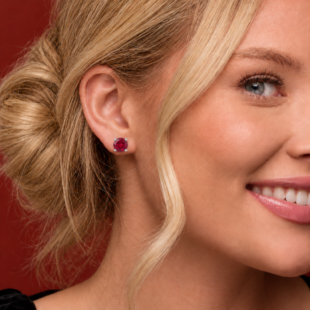 14K Gold Lab-Grown Ruby Scroll Setting® Stud Earrings — 14K White Gold — illustrative on-ear view