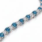 Fancy Vivid Blue and white lab-grown diamond Plus & Minus bracelet in 14k white gold, close-up studio view