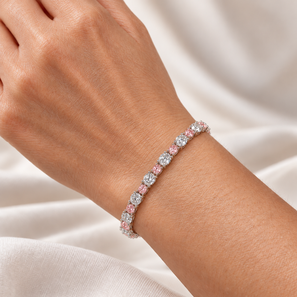 Fancy Vivid Pink and white lab-grown diamond Plus & Minus bracelet in 14k white gold, 4 mm bracelet shown on wrist