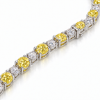 Fancy Vivid Yellow and white lab-grown diamond Plus & Minus bracelet in 14k white gold, close-up studio view