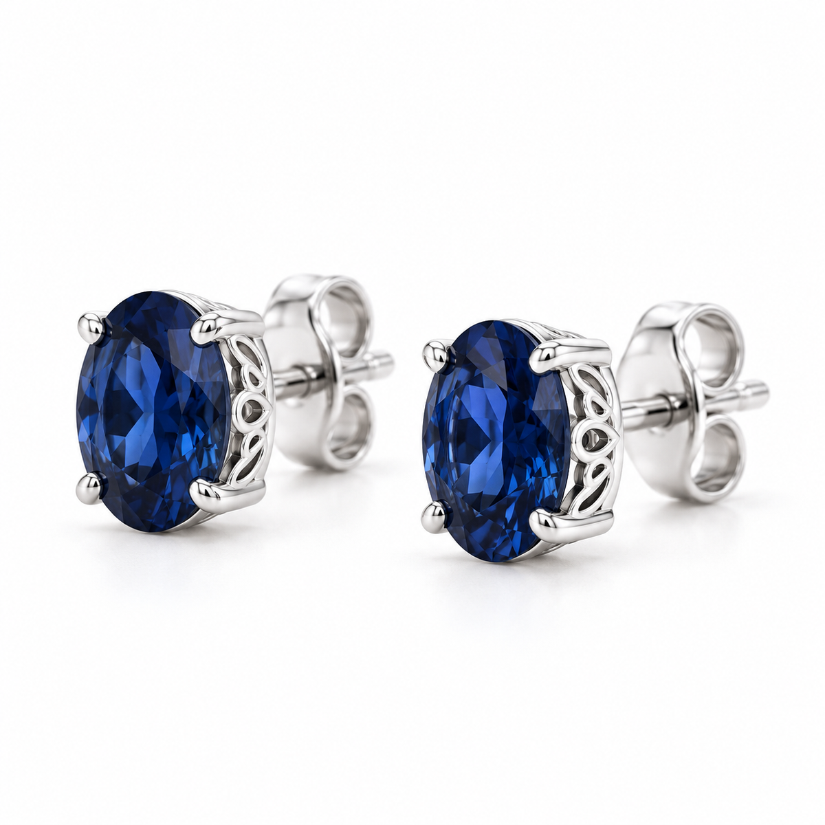 14K White Gold Lab-Grown Blue Sapphire Scroll Setting® Stud Earrings — 5 × 3 mm stones — enhanced studio view
