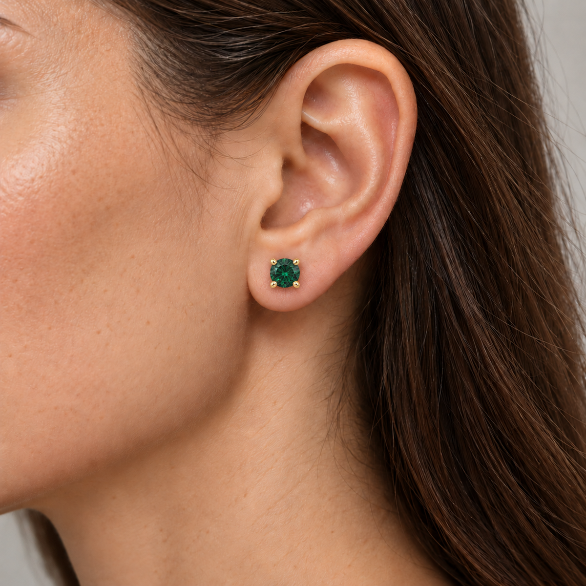 14K Yellow Gold Lab-Grown Emerald Scroll Setting® Stud Earrings — 6 mm stones — on-ear illustration based on listed dimensions
