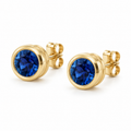 14K Yellow Gold Lab-Grown Blue Sapphire Classic Bezel Stud Earrings — 6 mm stones — enhanced studio view