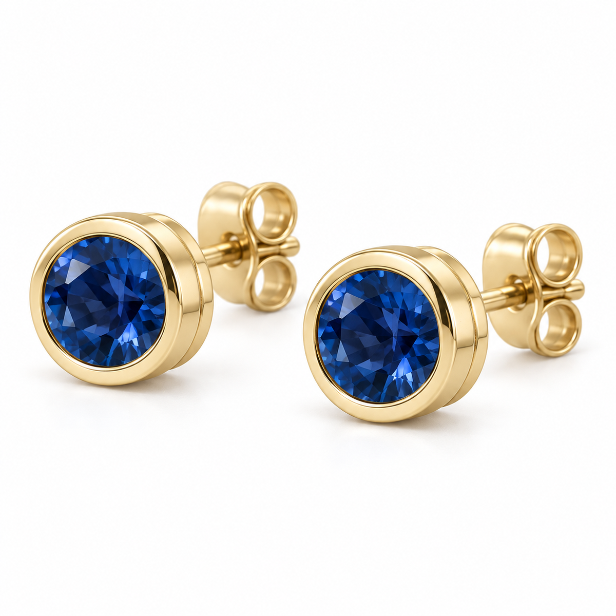 14K Yellow Gold Lab-Grown Blue Sapphire Classic Bezel Stud Earrings — 5 mm stones — enhanced studio view