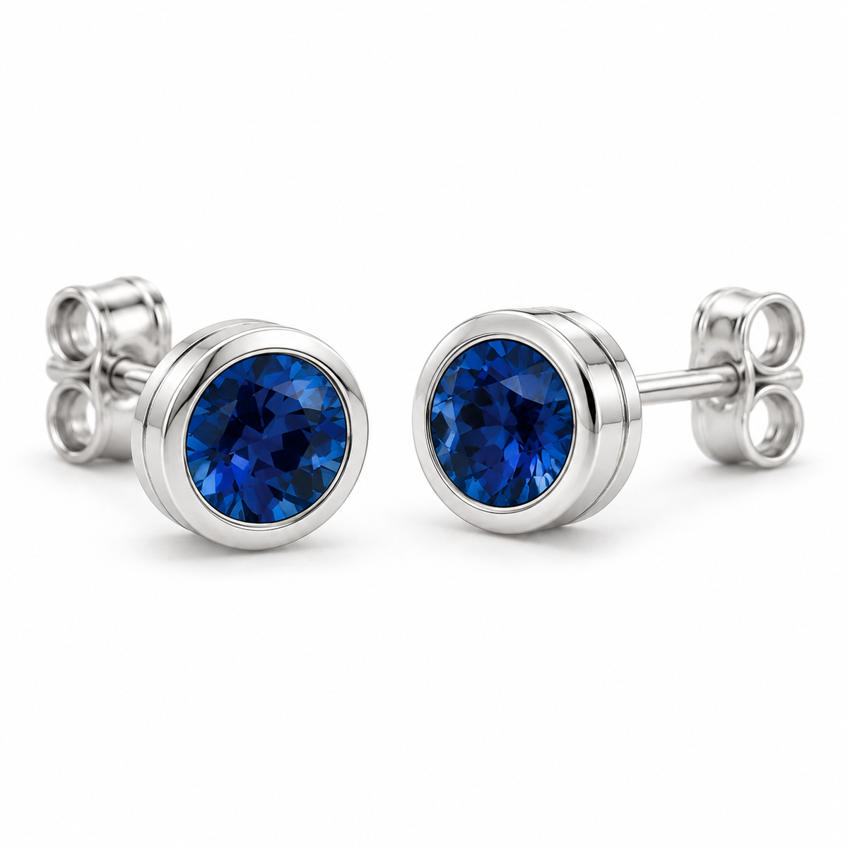 14K White Gold Lab-Grown Blue Sapphire Classic Bezel Stud Earrings — 4 mm stones — enhanced studio view