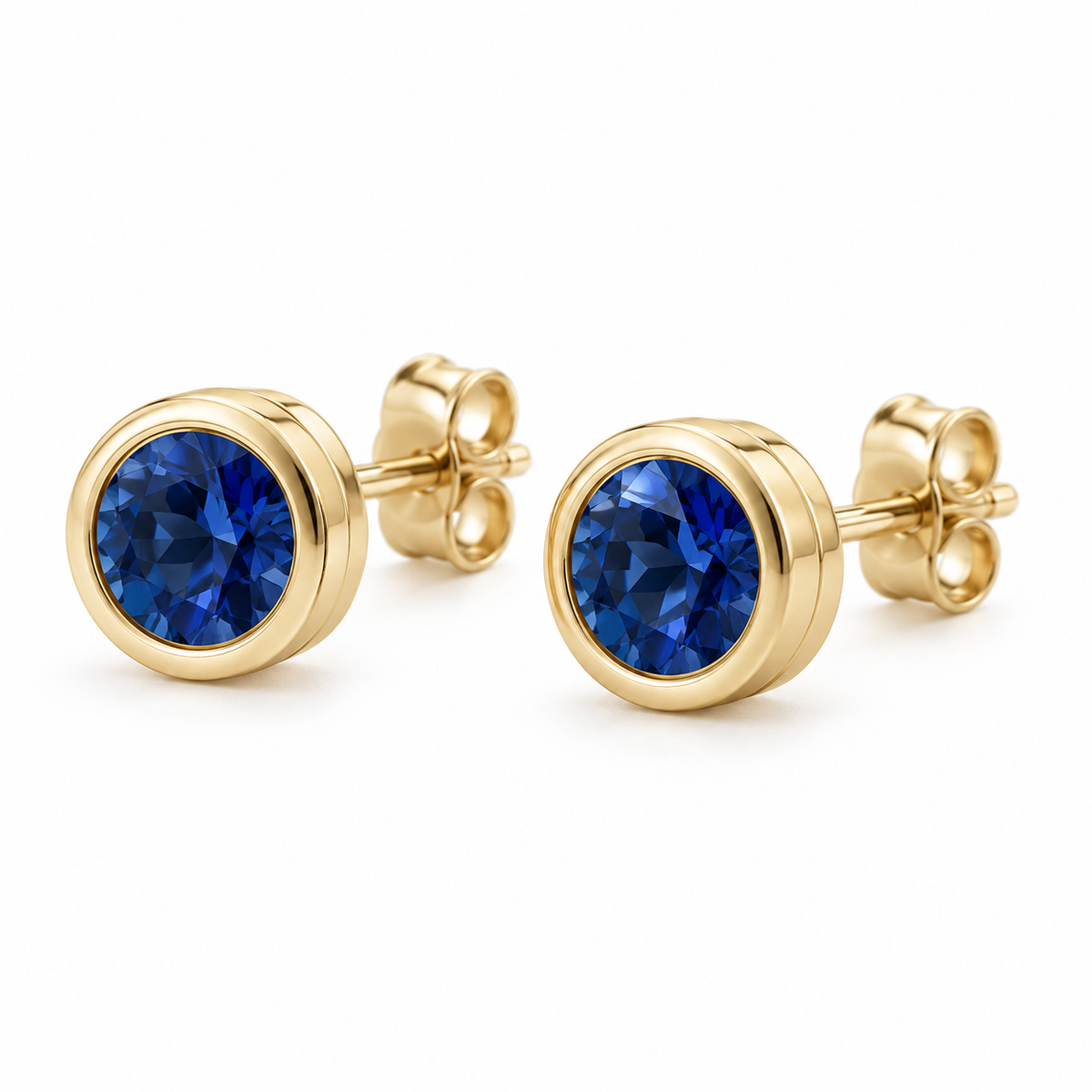 14K Yellow Gold Lab-Grown Blue Sapphire Classic Bezel Stud Earrings — 4 mm stones — enhanced studio view