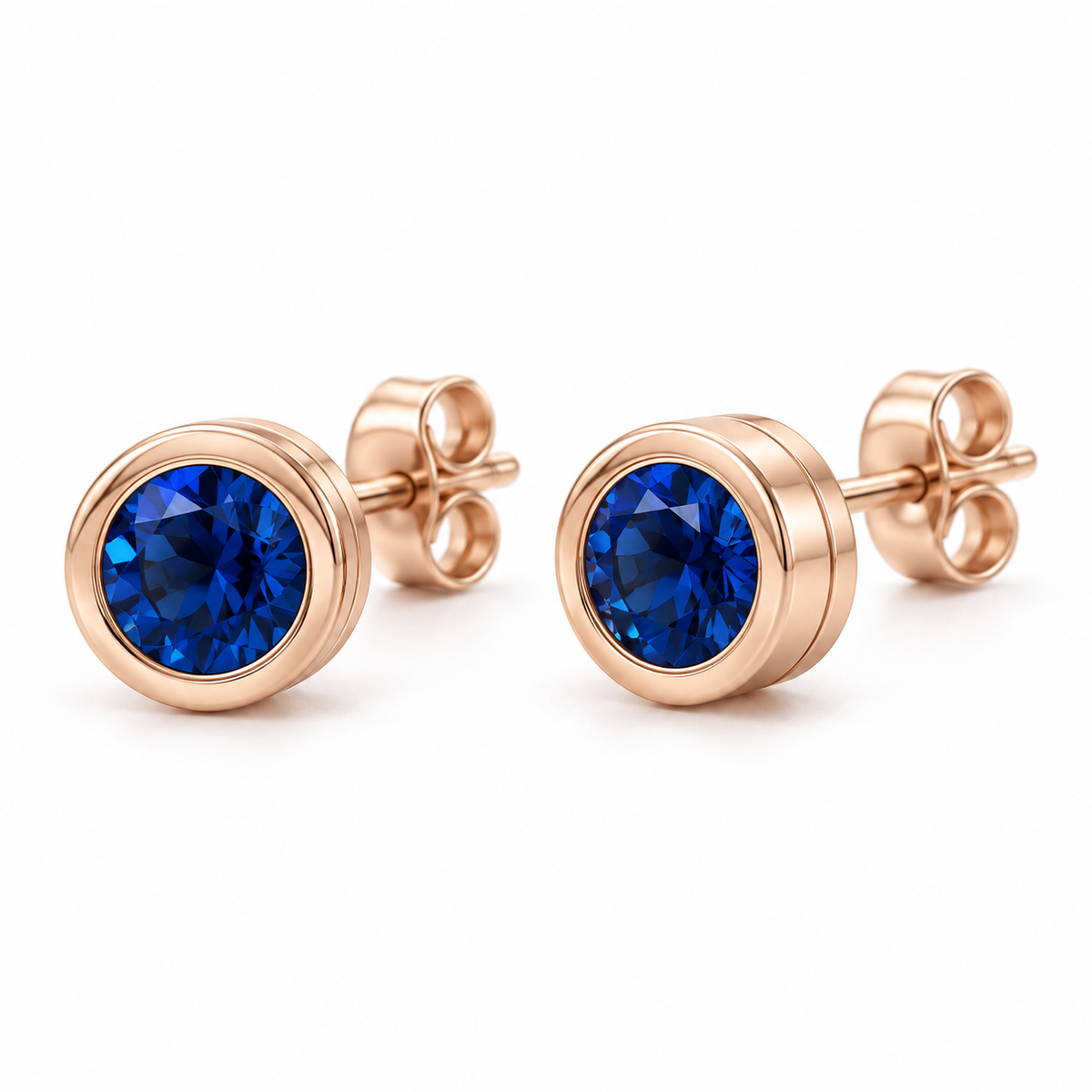 14K Rose Gold Lab-Grown Blue Sapphire Classic Bezel Stud Earrings — 4 mm stones — enhanced studio view