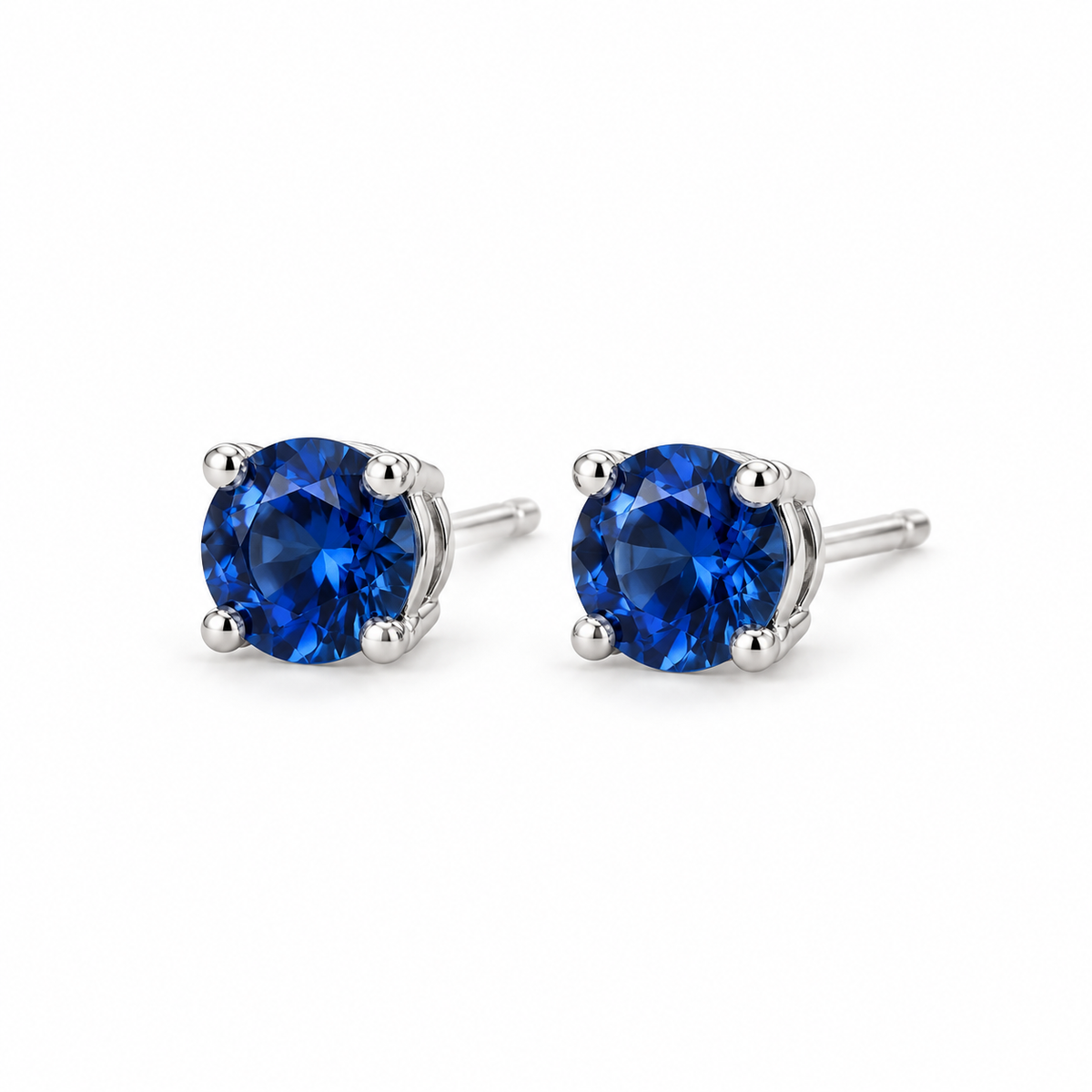 14K White Gold Lab-Grown Blue Sapphire Four-Prong Stud Earrings — 5 mm stones — enhanced studio view