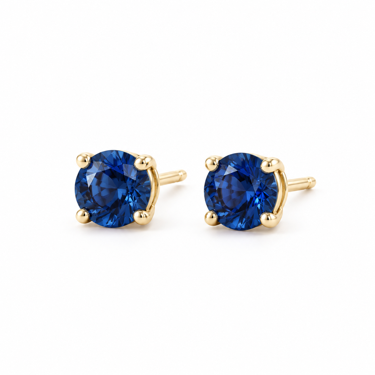 14K Yellow Gold Lab-Grown Blue Sapphire Four-Prong Stud Earrings — 5 mm stones — enhanced studio view