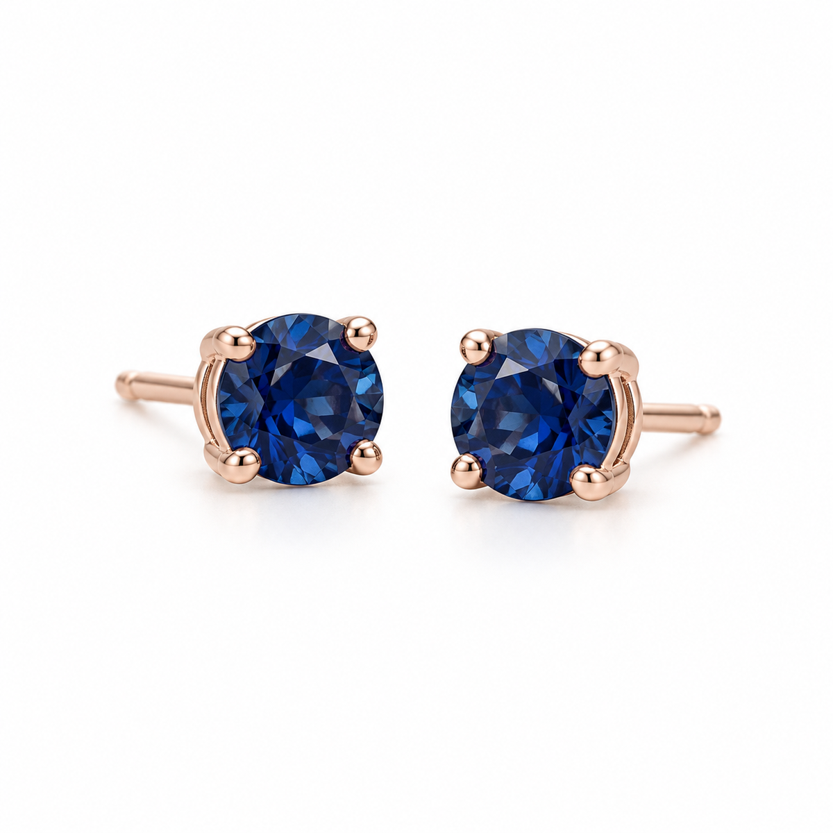 14K Rose Gold Lab-Grown Blue Sapphire Four-Prong Stud Earrings — 5 mm stones — enhanced studio view