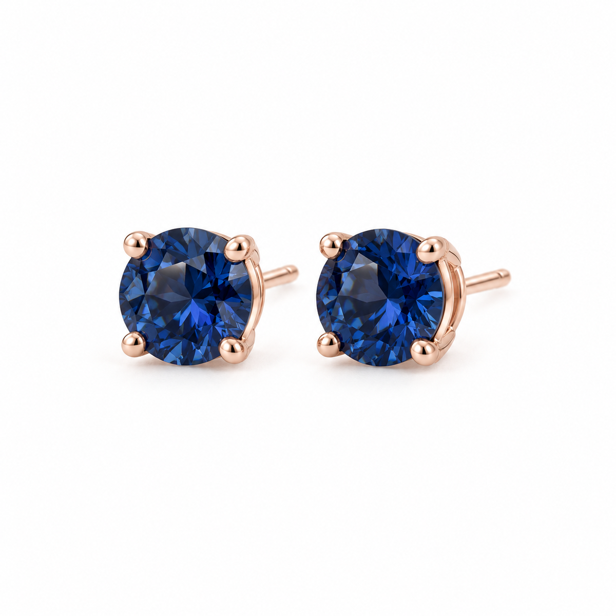 14K Rose Gold Lab-Grown Blue Sapphire Four-Prong Stud Earrings — 6 mm stones — enhanced studio view