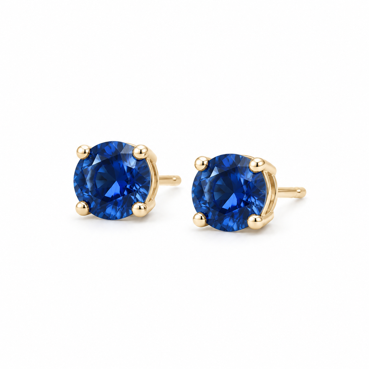 14K Yellow Gold Lab-Grown Blue Sapphire Four-Prong Stud Earrings — 6 mm stones — enhanced studio view