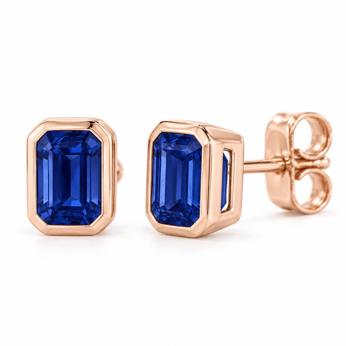 14K Rose Gold Lab-Grown Blue Sapphire Emerald-Cut Bezel Stud Earrings — 6 × 4 mm stones — enhanced studio view