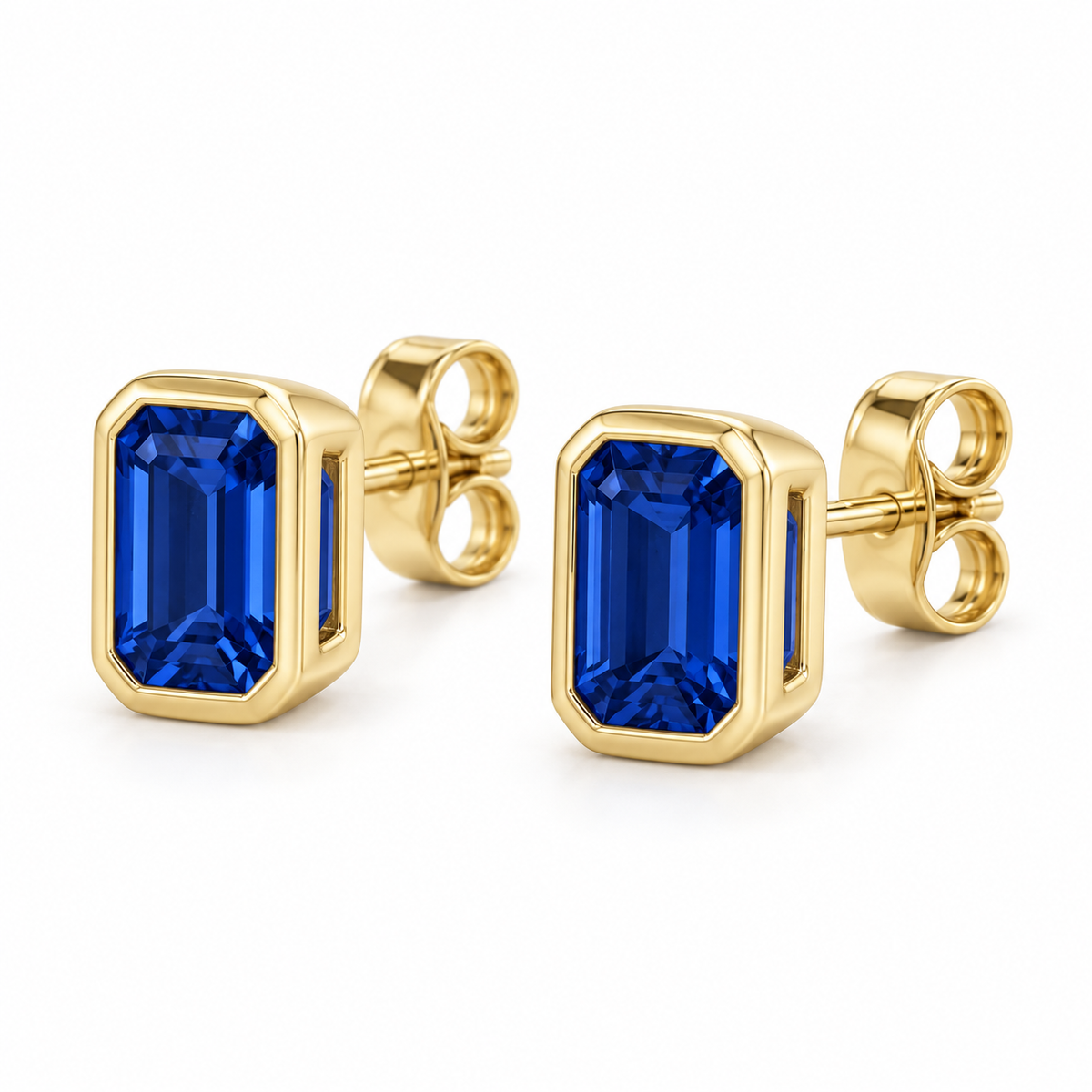 14K Yellow Gold Lab-Grown Blue Sapphire Emerald-Cut Bezel Stud Earrings — 6 × 4 mm stones — enhanced studio view