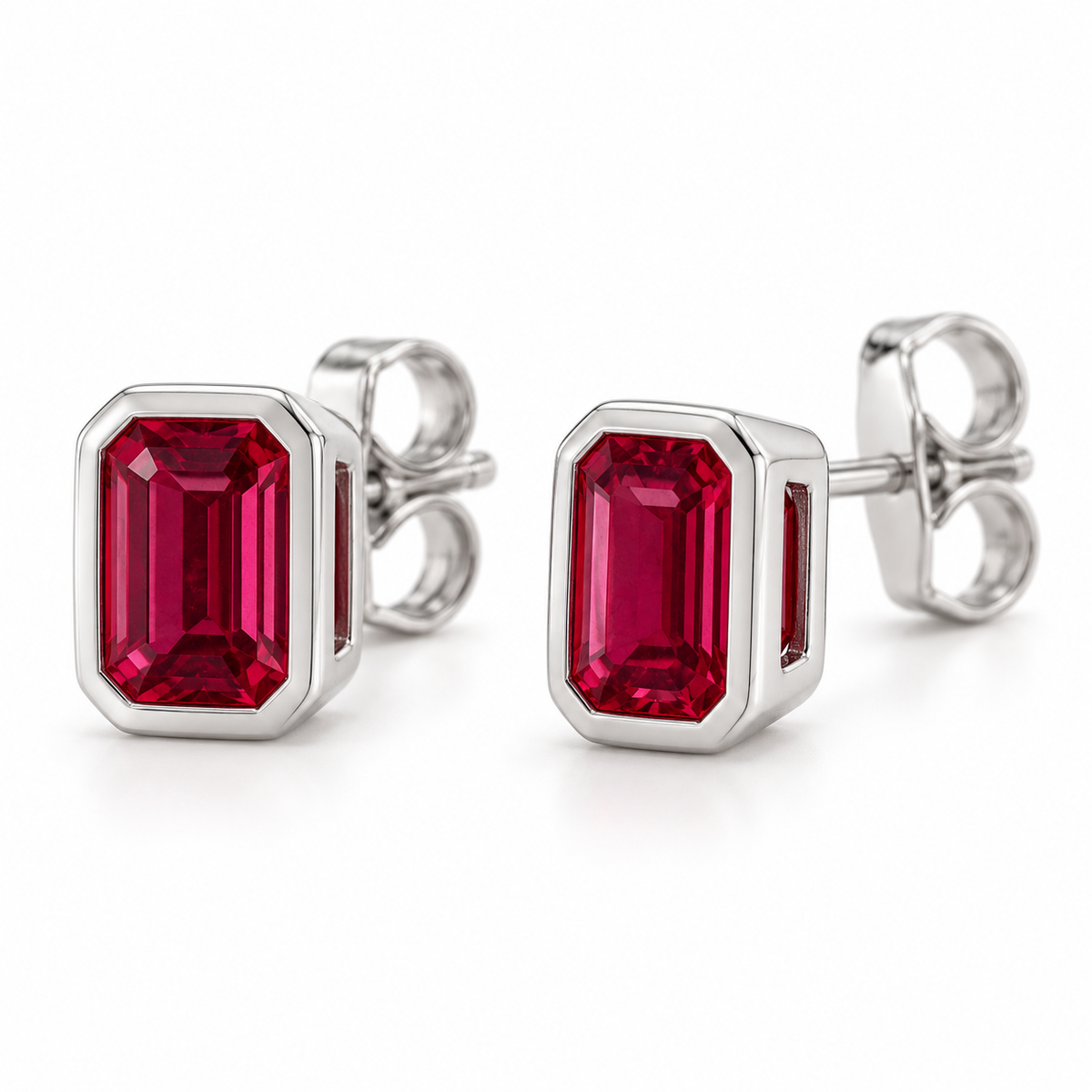 14K White Gold Lab-Grown Ruby Emerald-Cut Bezel Stud Earrings — 6 × 4 mm stones — enhanced studio view