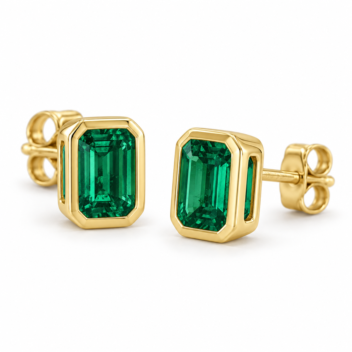 14K Yellow Gold Lab-Grown Emerald Emerald-Cut Bezel Stud Earrings — 6 × 4 mm stones — enhanced studio view