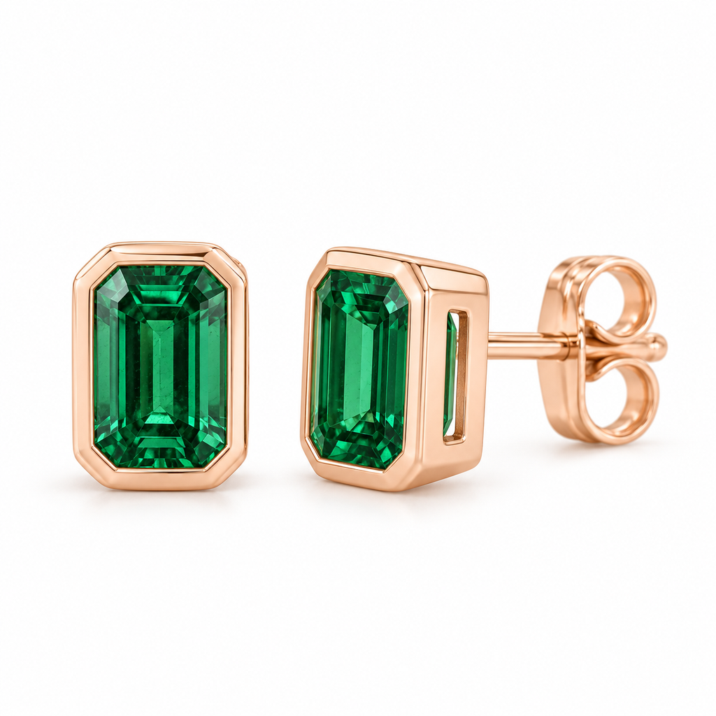 14K Rose Gold Lab-Grown Emerald Emerald-Cut Bezel Stud Earrings — 6 × 4 mm stones — enhanced studio view