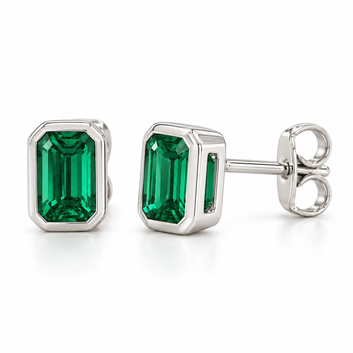 14K White Gold Lab-Grown Emerald Emerald-Cut Bezel Stud Earrings — 5 × 3 mm stones — enhanced studio view