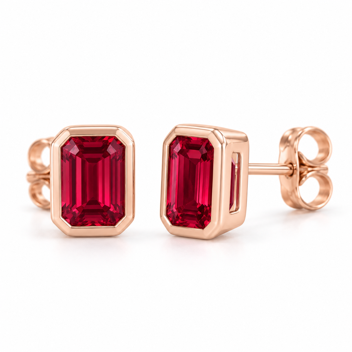 14K Rose Gold Lab-Grown Ruby Emerald-Cut Bezel Stud Earrings — 5 × 3 mm stones — enhanced studio view