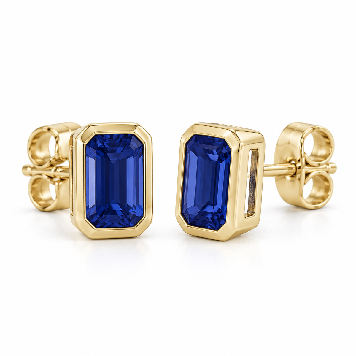 14K Yellow Gold Lab-Grown Blue Sapphire Emerald-Cut Bezel Stud Earrings — 5 × 3 mm stones — enhanced studio view