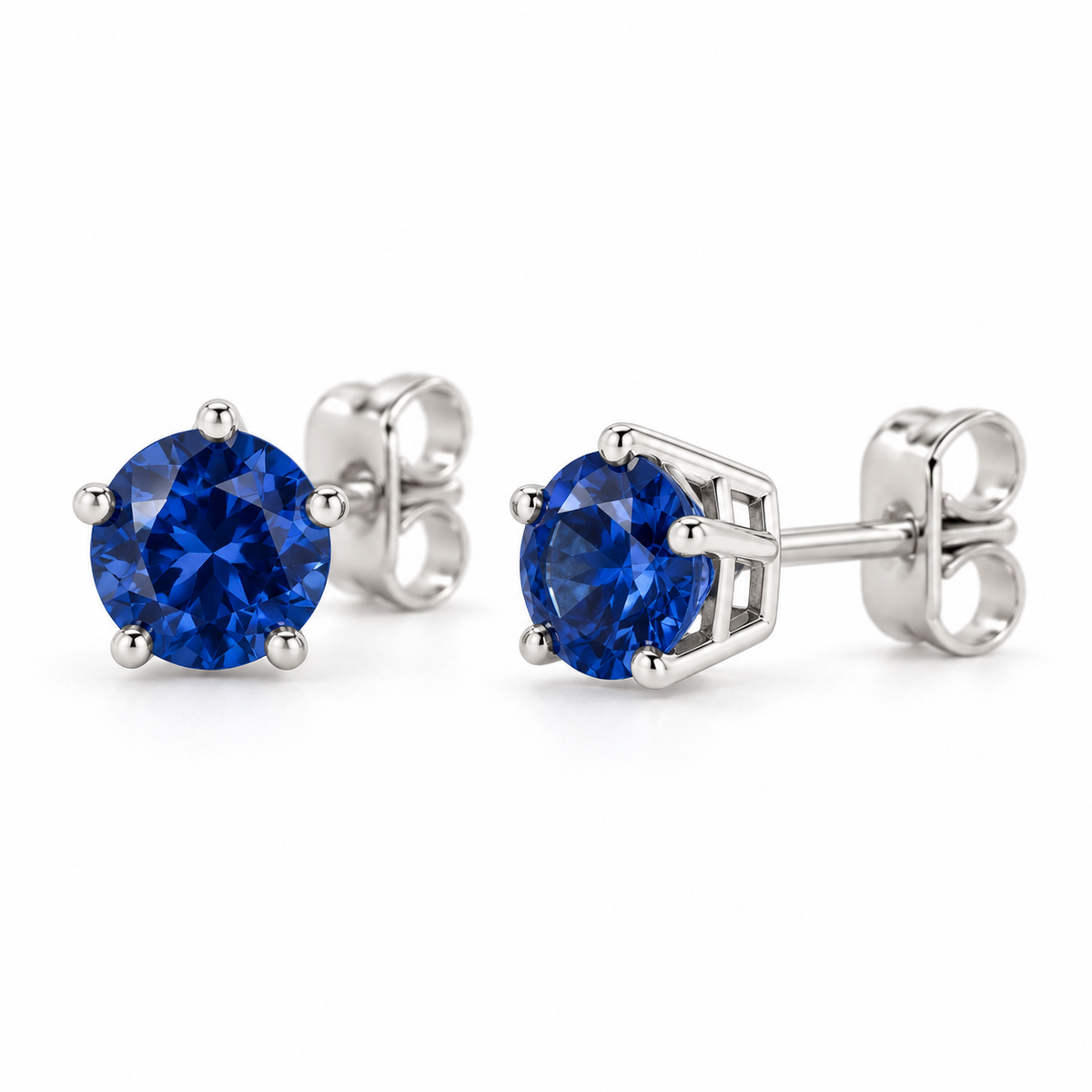 14K White Gold Lab-Grown Blue Sapphire Solitaire Stud Earrings — 4 mm stones — enhanced studio view