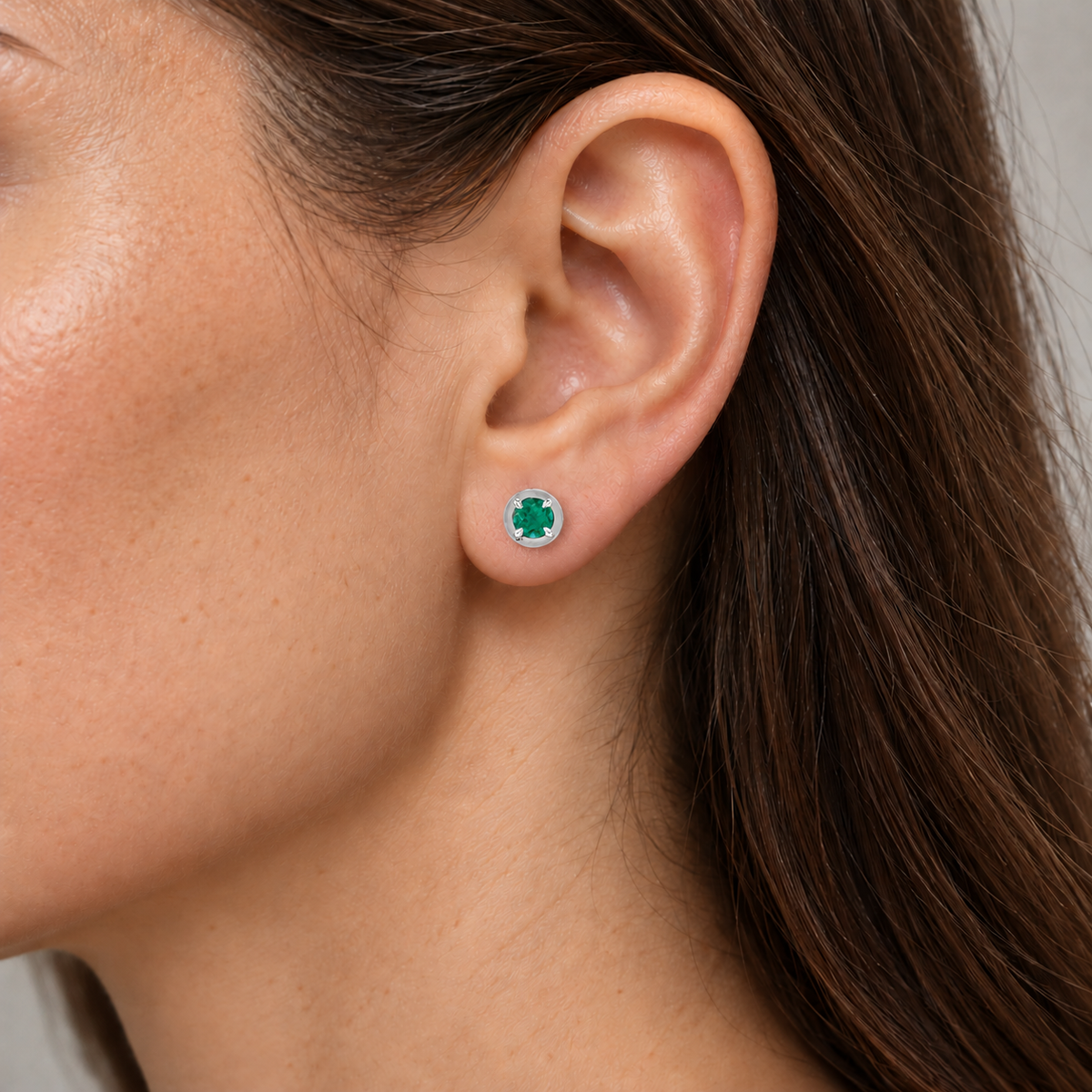14K White Gold Lab-Grown Emerald Claw Bezel Stud Earrings — 5 mm stones — on-ear illustration based on listed dimensions