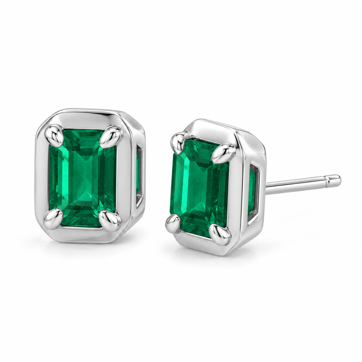 14K White Gold Lab-Grown Emerald Emerald-Cut Claw Bezel Stud Earrings — 6 × 4 mm stones — enhanced studio view