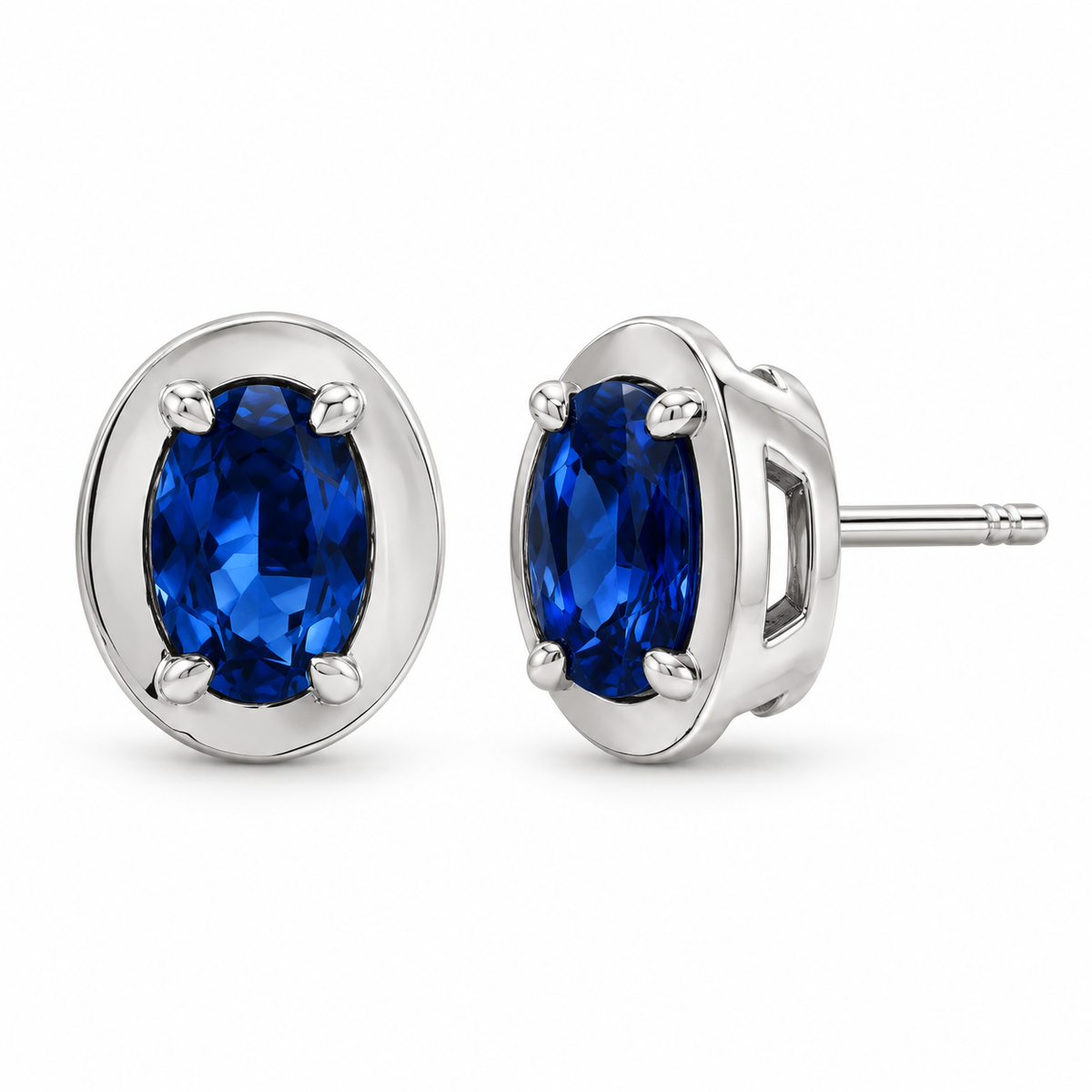 14K White Gold Lab-Grown Blue Sapphire Oval Claw Bezel Stud Earrings — 6 × 4 mm stones — enhanced studio view