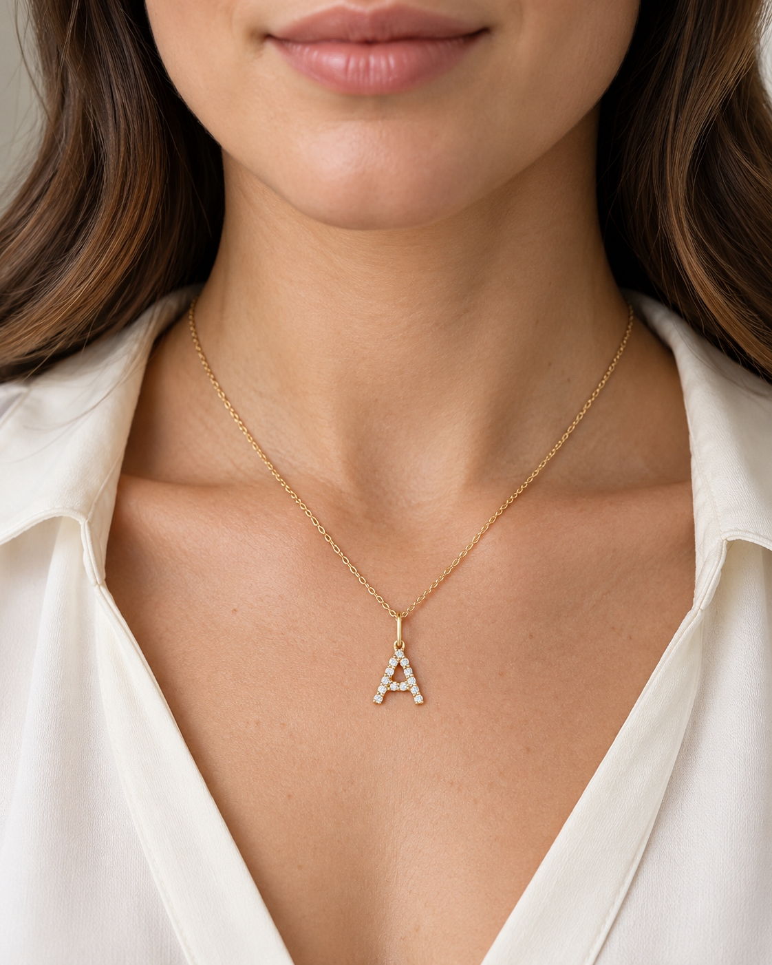 Initial A — 14K Yellow Gold — on-body necklace photo