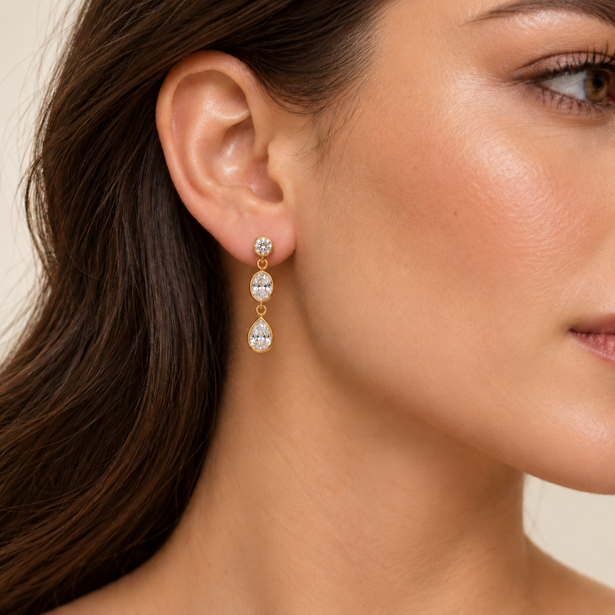 30mm multi-shape diamond drop earring worn on ear