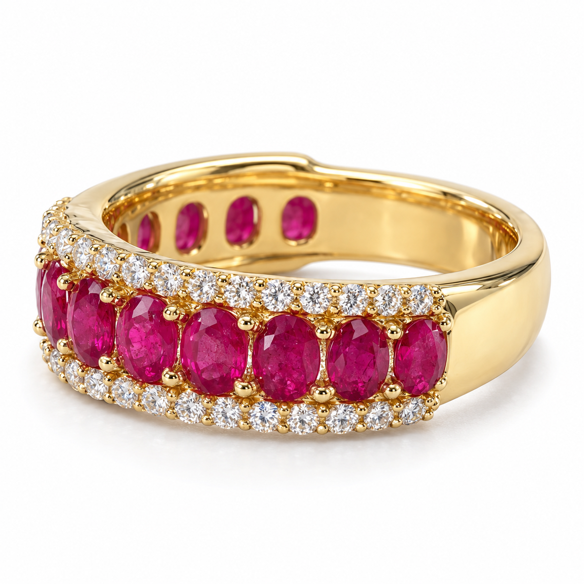 Natural oval ruby and diamond 14K yellow gold band — angled view