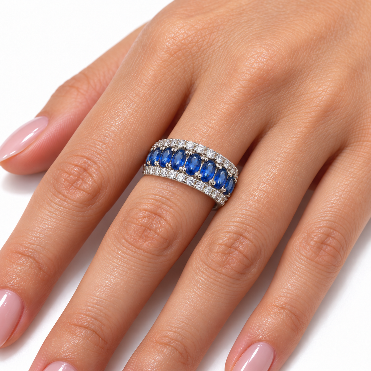 Oval sapphire and diamond ring — on-hand view
