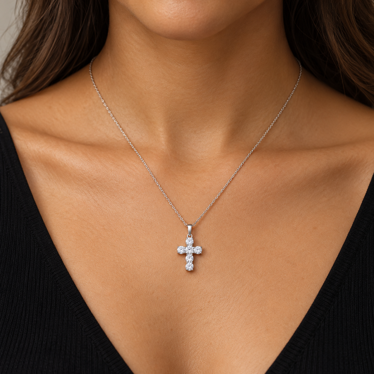 0.33 CTW six-diamond cross necklace in 14K white gold — on-body styling illustration