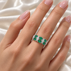 Oval emerald and diamond band in 14K white gold, hand view