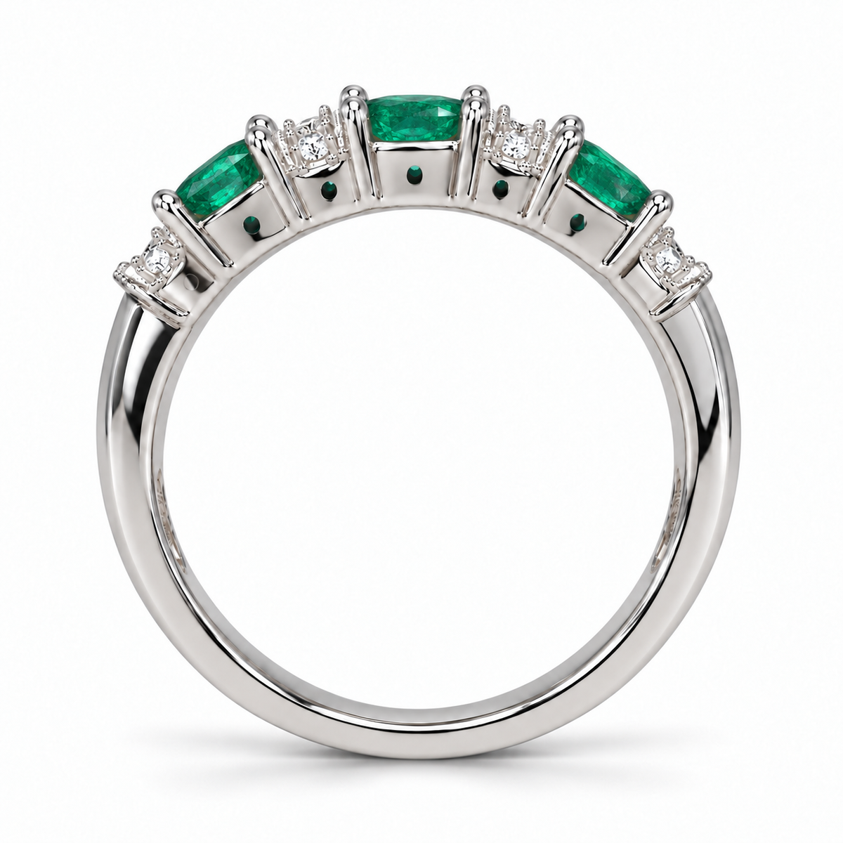 Oval emerald and diamond band in 14K white gold, side view