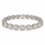 Front studio view of women's oval halo lab-grown diamond bracelet in 18k white gold