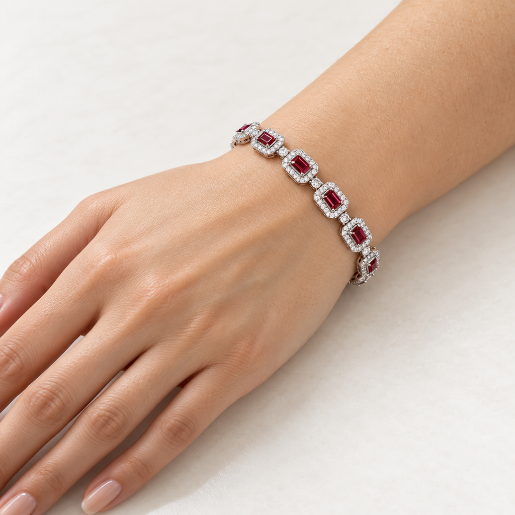 Women's emerald-cut lab-grown ruby and diamond halo bracelet in 14K white gold — on wrist