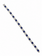 Full-length view of 7-inch oval lab-grown sapphire and diamond bracelet in 14k white gold